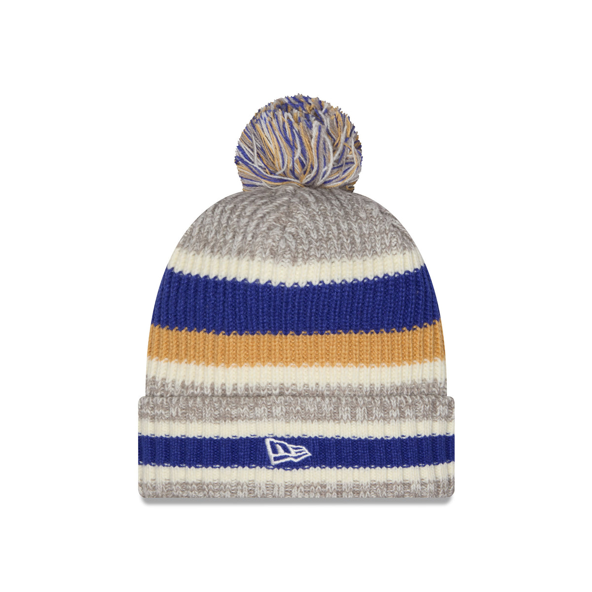 Side of a knit pom-pom Vancouver Goldeneyes beanie hat featuring horizontal stripes in heather gray, blue, cream, and gold, with a folded cuff featuring a New Era Logo.