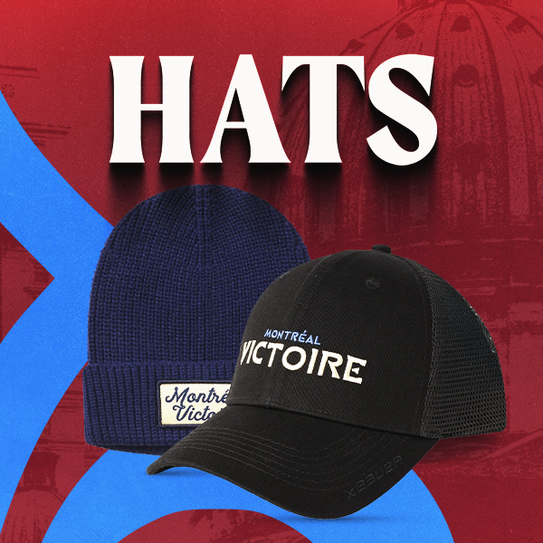 Two baseball caps displayed against a red and blue graphic background with the word HATS above. The front cap is black with white embroidered text reading Montreal Victoire, and the back cap is navy blue with a matching navy-and-white patch.