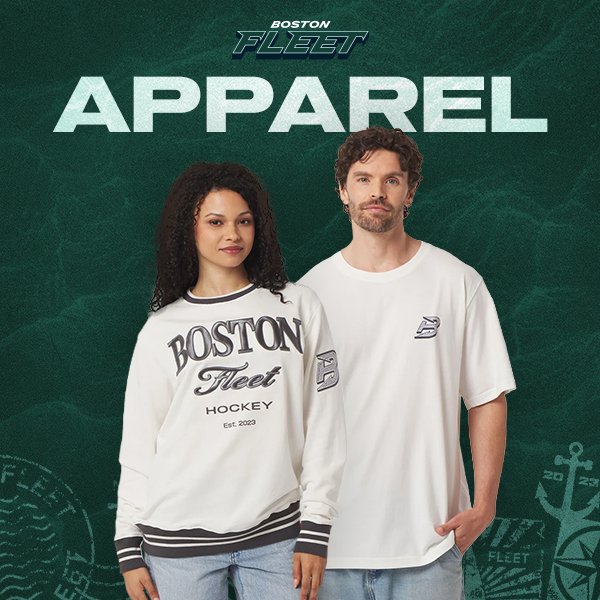 A man and a woman modeling Boston Fleet Apparel clothing against a dark green branded backdrop. The woman wears a cream sweatshirt with navy lettering and stripes, and the man wears a cream T-shirt with a small navy logo.