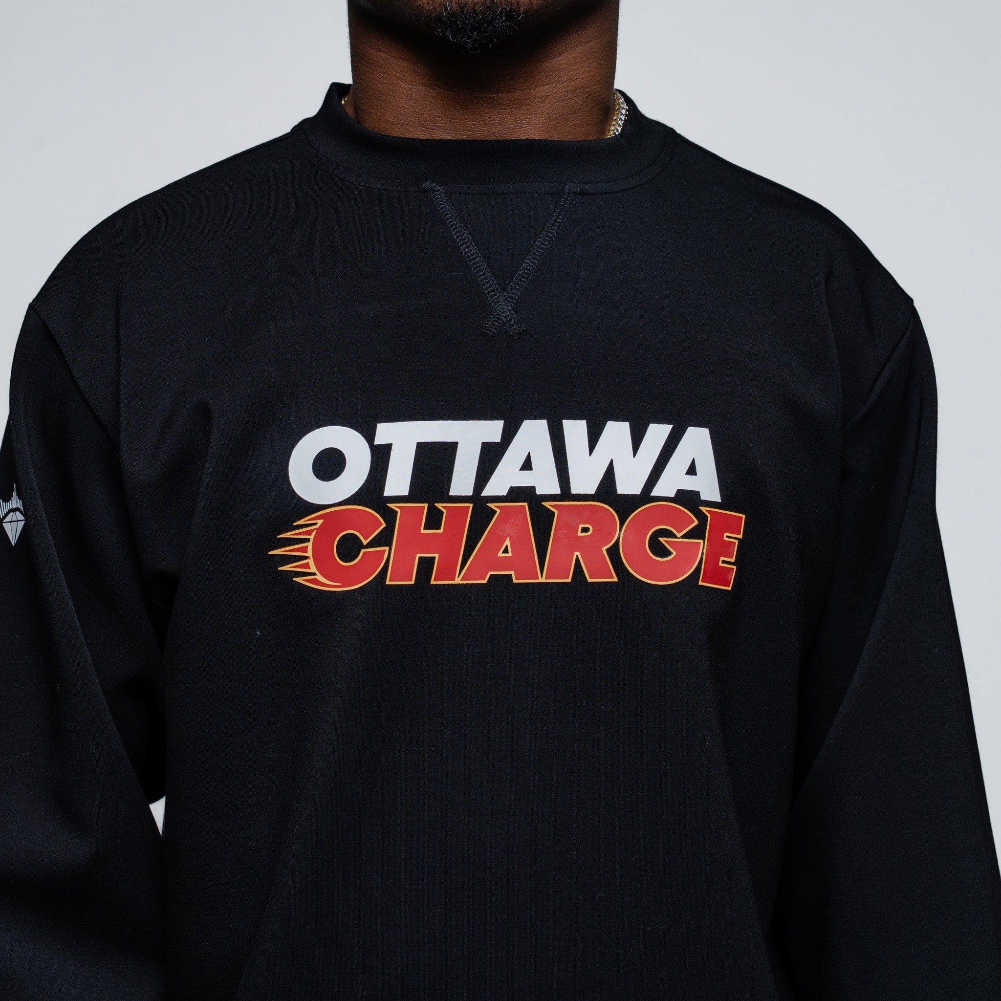 Black sweatshirt with 'Ottawa Charge' text on a plain background