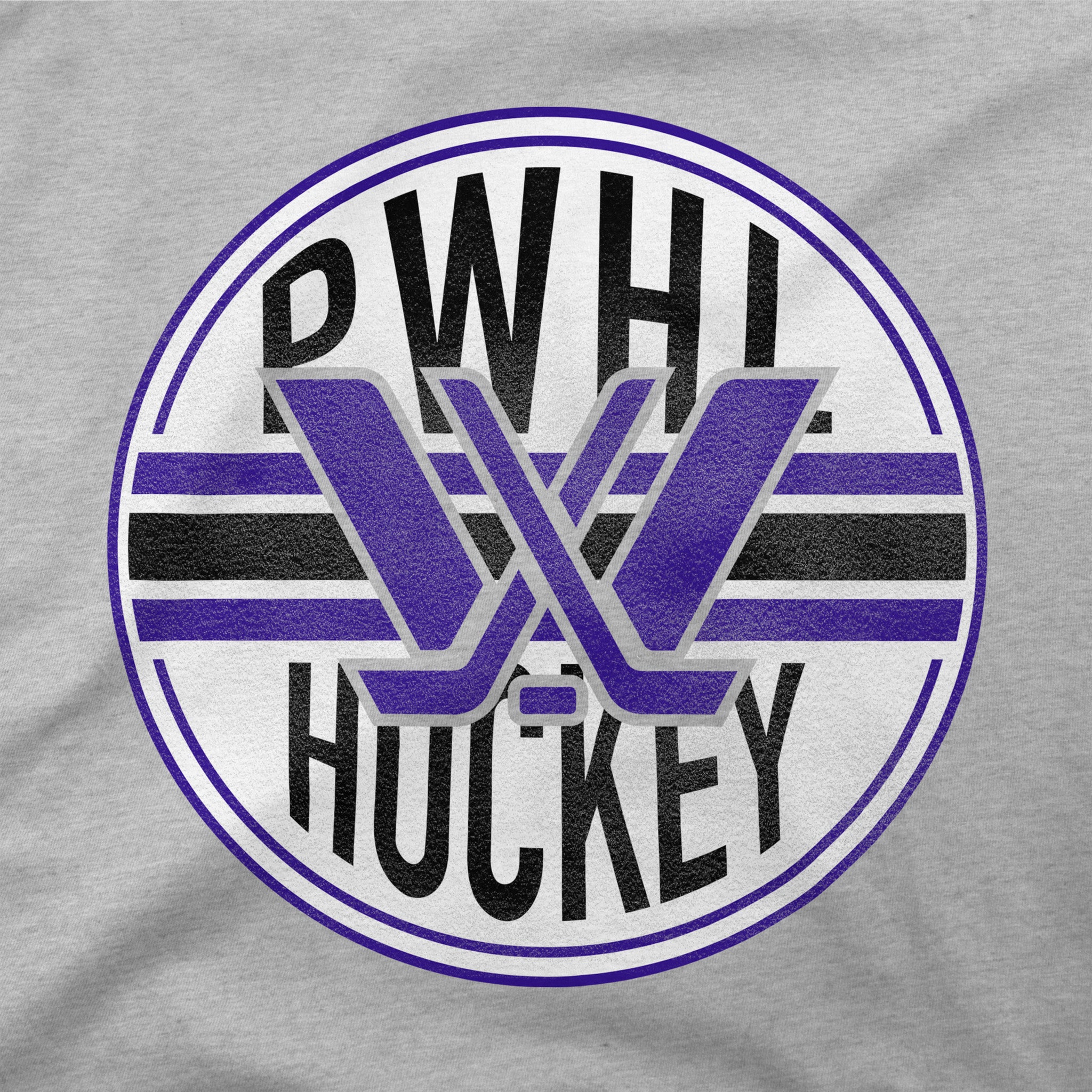 A close-up of a heather gray t-shirt featuring a circular graphic print with the text 'PWHL HOCKEY' and a stylized purple and black 'W' logo.
