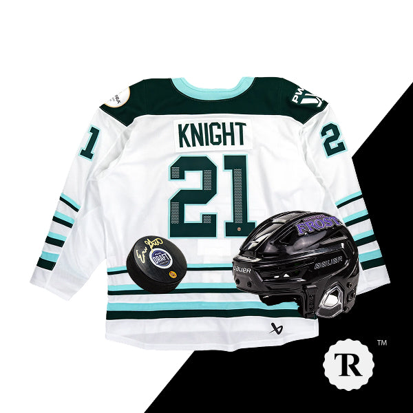 Hockey jersey with number 21, helmet, and signed puck on a white and black background