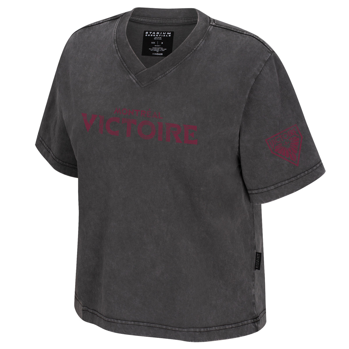 The front of a dark gray was short sleeve V-neck shirt. 'MONTREAL VICTOIRE' is in burgundy across the front. The Montreal Victoire logo is in burgundy in the left sleeve.